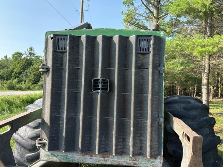 2015-deere-648l-image-58