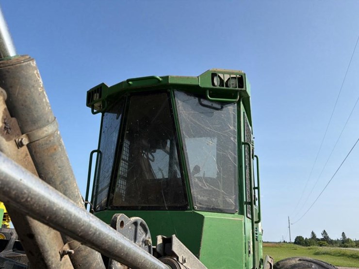 2015-deere-648l-image-56