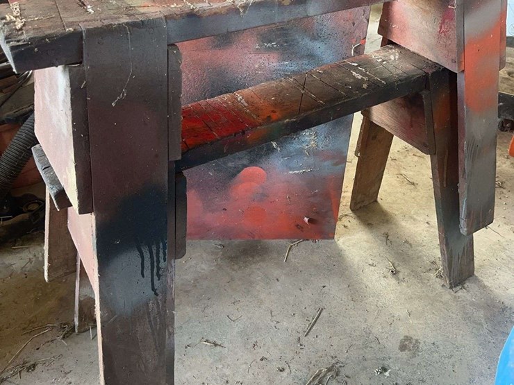 industrial-style-wooden-workshop-sawhorses-and-plywood-board-image-2