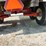 spray-wagon-on-unverferth-mccurdy-g12-running-gear-with-native-flat-rack-image-12