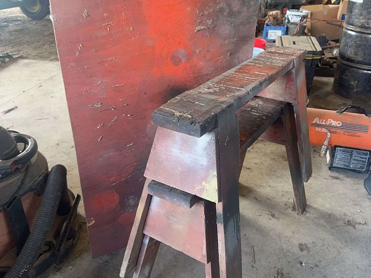 industrial-style-wooden-workshop-sawhorses-and-plywood-board-image-1