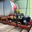 spray-wagon-on-unverferth-mccurdy-g12-running-gear-with-native-flat-rack-image-23