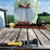 spray-wagon-on-unverferth-mccurdy-g12-running-gear-with-native-flat-rack-image-20
