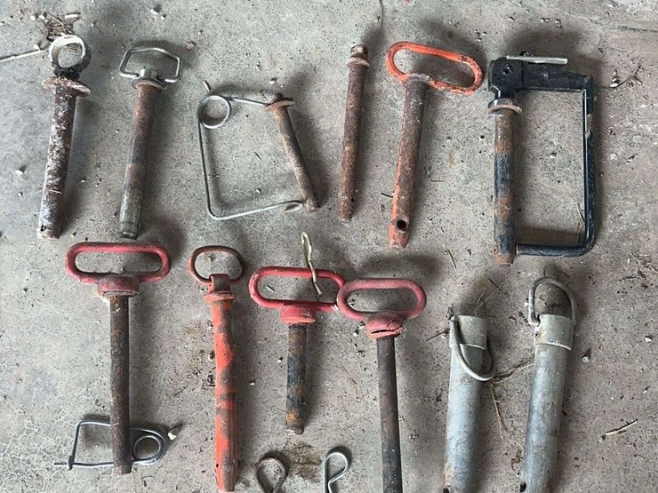 assorted-tractor-hitch-pins-clevis-pins-and-hardware-accessories-lot-image-1