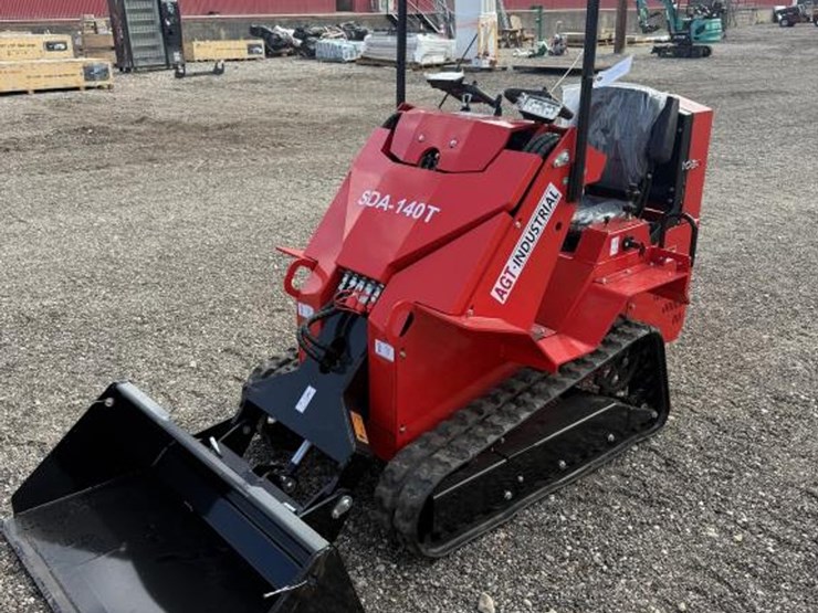 #7-•-mini-skid-steer-tracked-ride-on-loader--gas-image-1