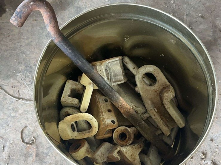 assorted-industrial-metal-hardware-including-cage-wheel-clamps-image-1