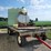 spray-wagon-on-unverferth-mccurdy-g12-running-gear-with-native-flat-rack-image-17
