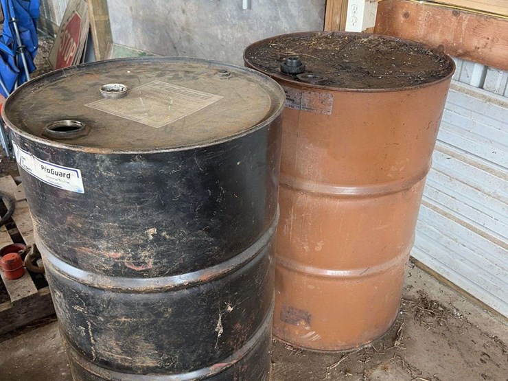 fifty-five-gallon-drums-full-of-used-oil-image-1