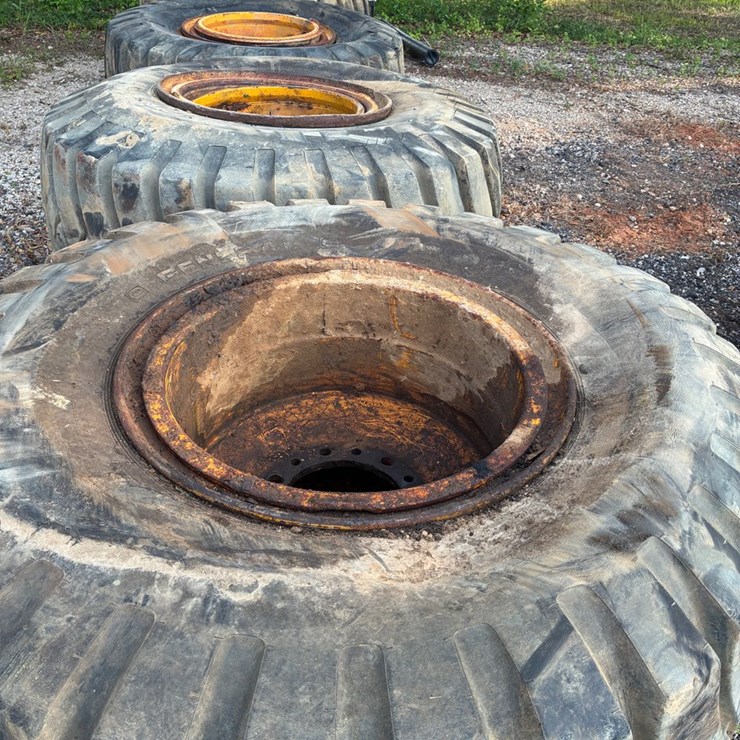 #2440 • 4 28.5 -25 dirt pan tires with wheels