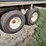 spray-wagon-on-unverferth-mccurdy-g12-running-gear-with-native-flat-rack-image-5