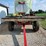 spray-wagon-on-unverferth-mccurdy-g12-running-gear-with-native-flat-rack-image-19