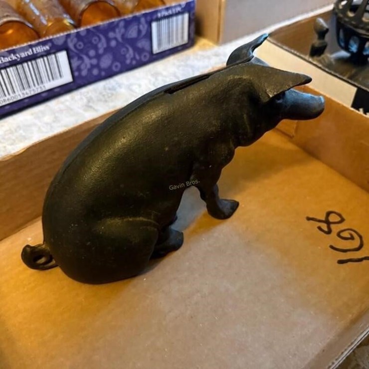 Cast Iron Piggie Bank w/some change