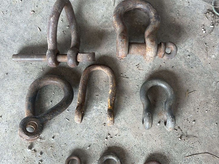 antique-cast-iron-farm-tractor-shackle-clevis-hardware-lot-image-1