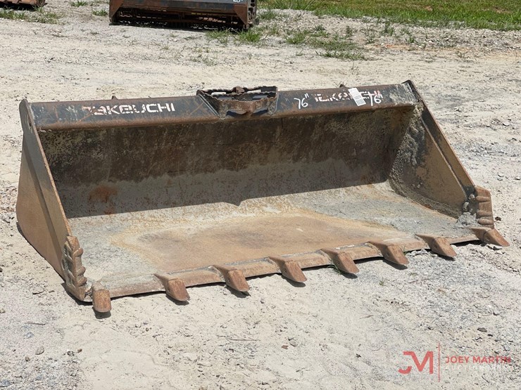 takeuchi-76"-tooth-bucket-skid-steer-attachment-image-1