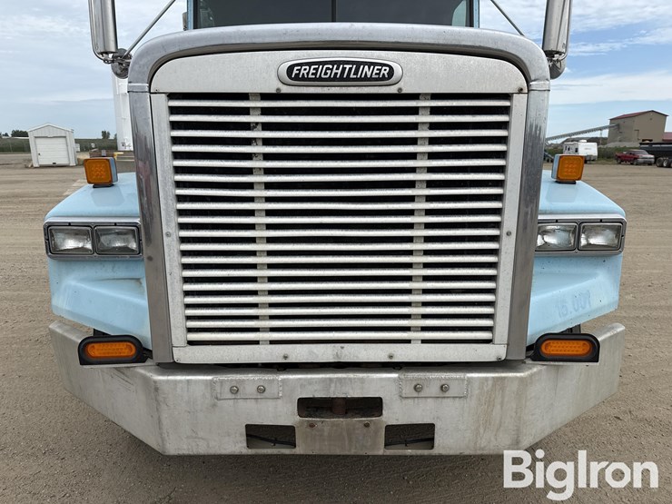 2000-freightliner-fld120sd-tri/a-day-cab-truck-tractor-w/wet-kit-image-10