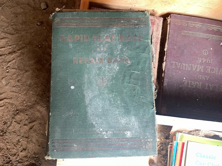 #1248-•-wooden-crate-of-vintage-automotive-manuals-image-5