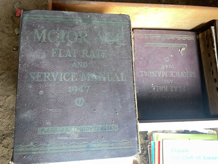#1248-•-wooden-crate-of-vintage-automotive-manuals-image-4