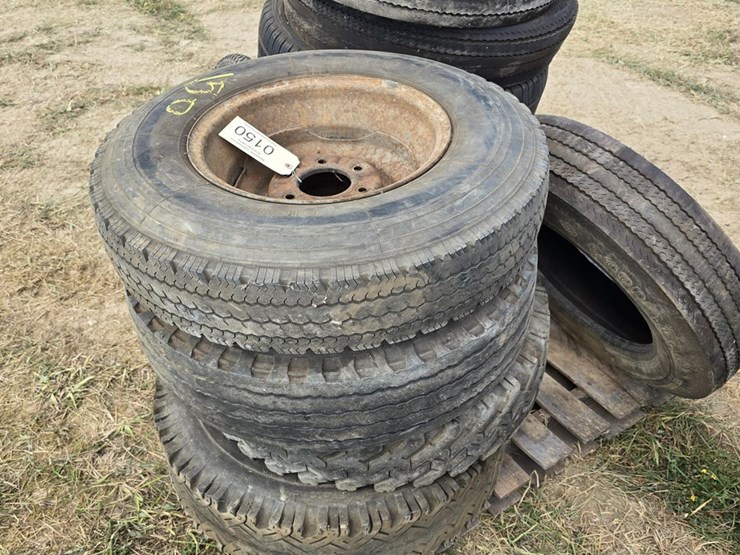 #150-•-palette-of-various-tires-some-with-rims-image-1