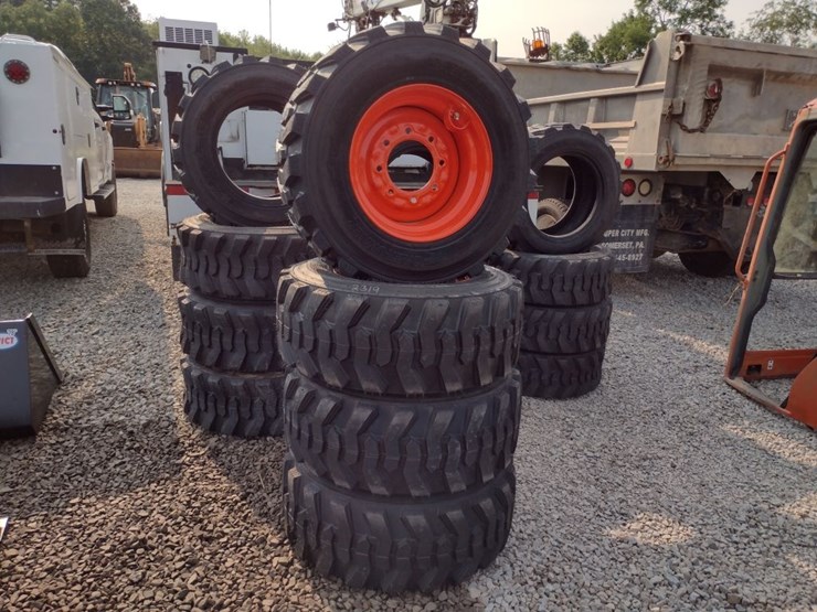 (4)-12-16.5-tires-on-bc-wheels-(qea-2319)-image-1