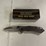 #10819-•-tactical-drop-point-serrated-lock-back-knife-image-1