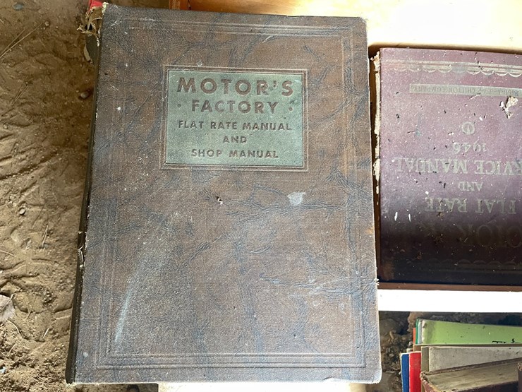 #1248-•-wooden-crate-of-vintage-automotive-manuals-image-7
