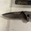 #10819-•-tactical-drop-point-serrated-lock-back-knife-image-2