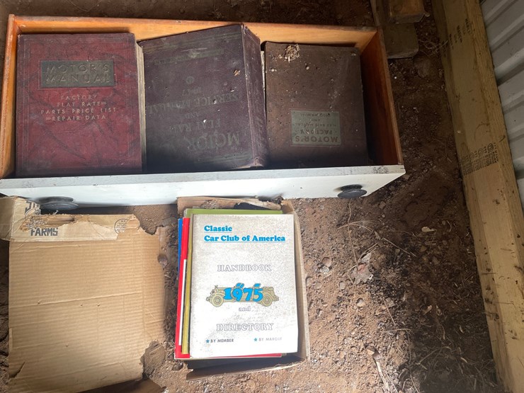 #1248-•-wooden-crate-of-vintage-automotive-manuals-image-1