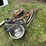 #6109-•-hydraulic-hoses,-stainless-steel-bowls,-hub-caps-&-pick-axe-image-1