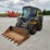 2013-deere-320d-image-1