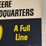 john-deere-hardware-headquarters-double-sided-masonite-sign-image-4