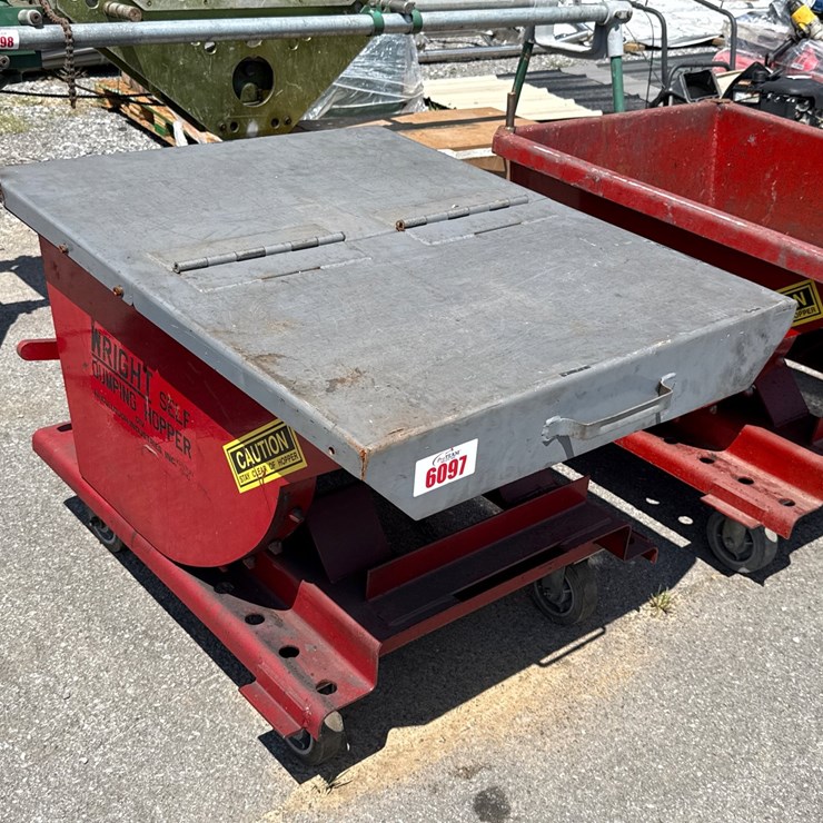 #6097 • SMALL FORKLIFT SELF DUMPING DUMPSTER