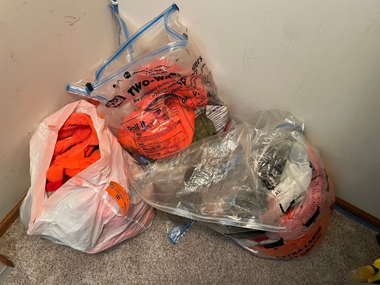 #7307-•-(4)-bags-of-hunting-clothing-image-1