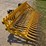 shoule-hb-7-rock-fork,-has-bolt-on-mounts,-84”-wide,-1-3/8”-round-bar-tine,-5”-spacing,-heavy-duty,-image-1