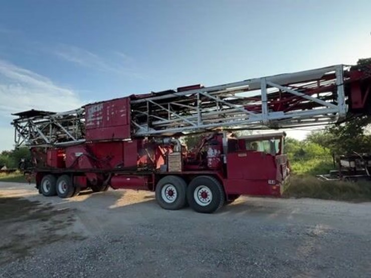 1979-franks-explorer-iii-1287/160-dtd-ht-96’-215k-4-axle-well-service-workover-rig-image-1