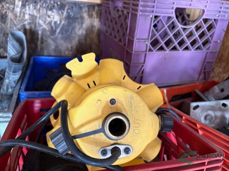 crates-of-electric-pumps,-covers-and-casters-image-3