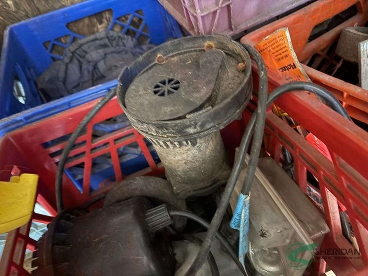 crates-of-electric-pumps,-covers-and-casters-image-5