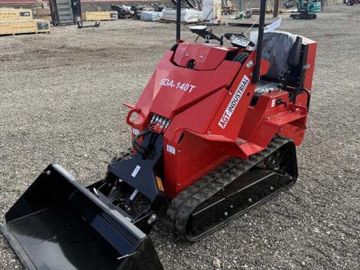 #7-•-mini-skid-steer-tracked-ride-on-loader--gas-image-1