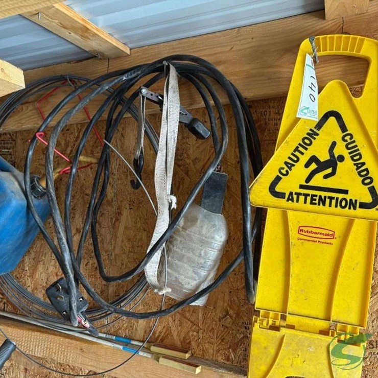 Copper wire, fuel can and caution sign