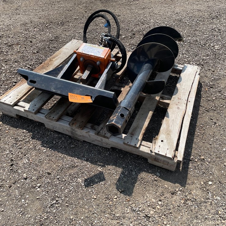 #4521 • Wolverine Mini Skidsteer Auger