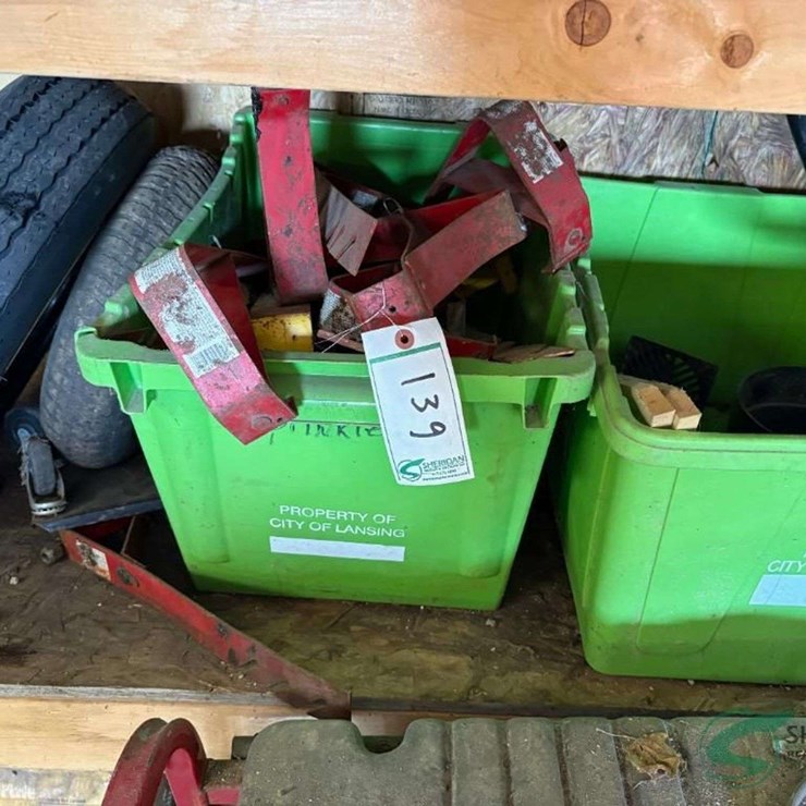 Totes and contents, trailer wheels, roof jacks, pool filter and misc.