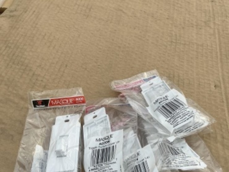 pallet-of-toggle-switch-covers-image-3