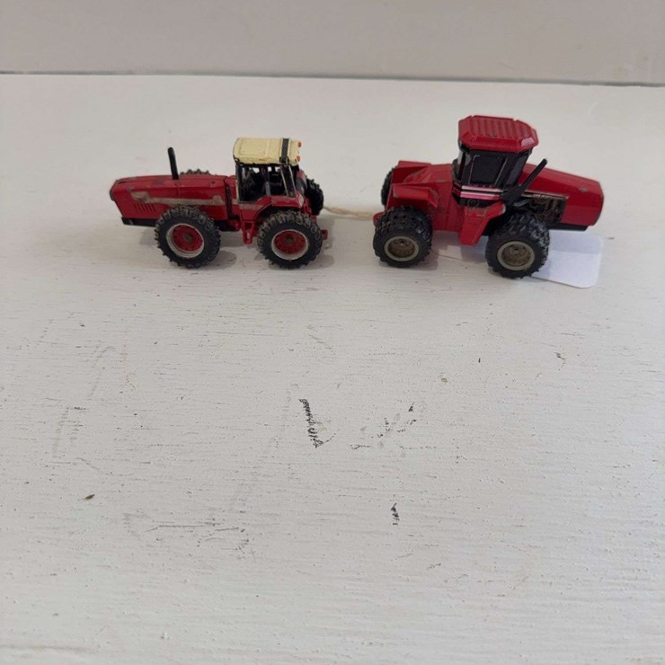 2 Case IH 1/64 scale toy tractors