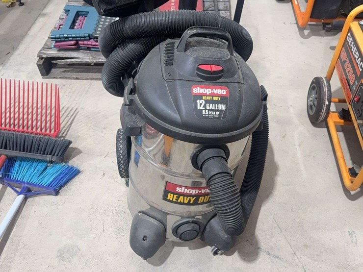 12-gallon-shop-vac-with-accessories,-wheel-is-broken-image-1