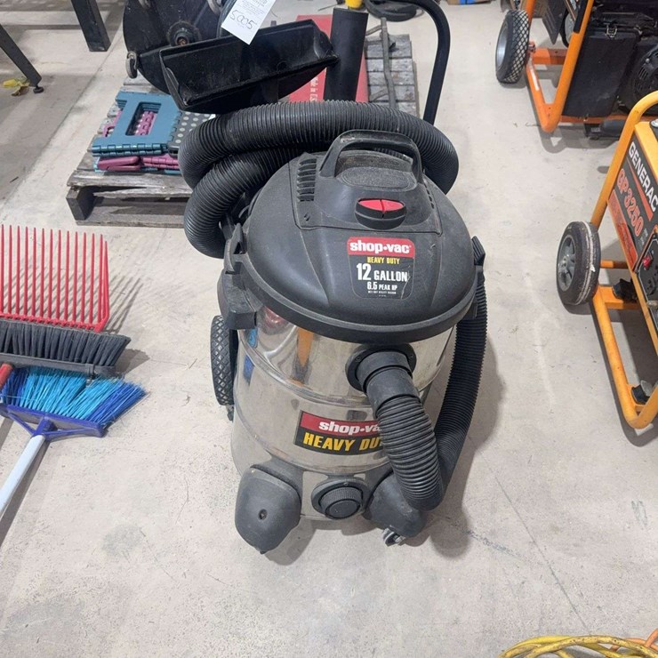 12 gallon shop-vac with accessories, wheel is broken