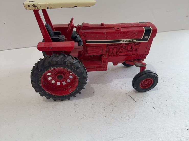 international-1066-march-1991-toy-tractor,-missing-muffler,-die-cast-metal,-1/16-scale-image-1