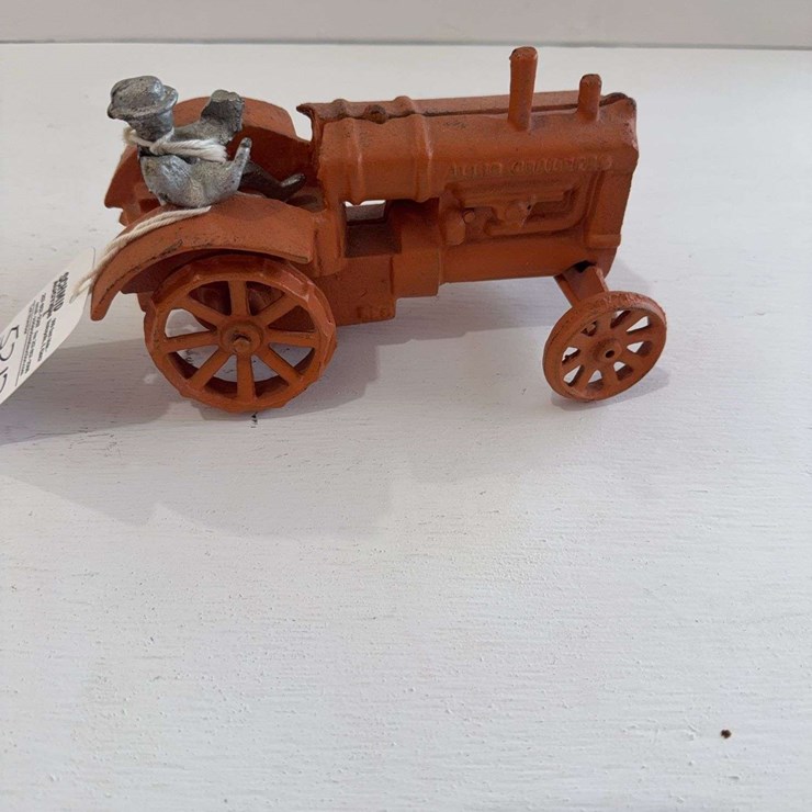 Allis-Chalmers cast iron toy tractor, 1/16 scale, figurine is broke