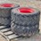 (4)-12-16.5-skid-steer-tires-and-wheels-image-1
