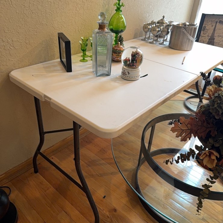 White folding table (table only, items are listed separately)