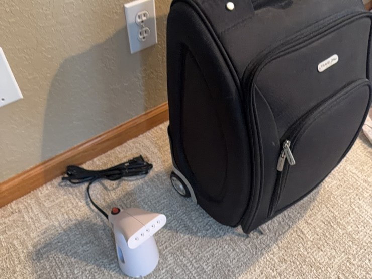 wrinkle-remover-and-like-new-travelon-pull-type-suitcase-image-2