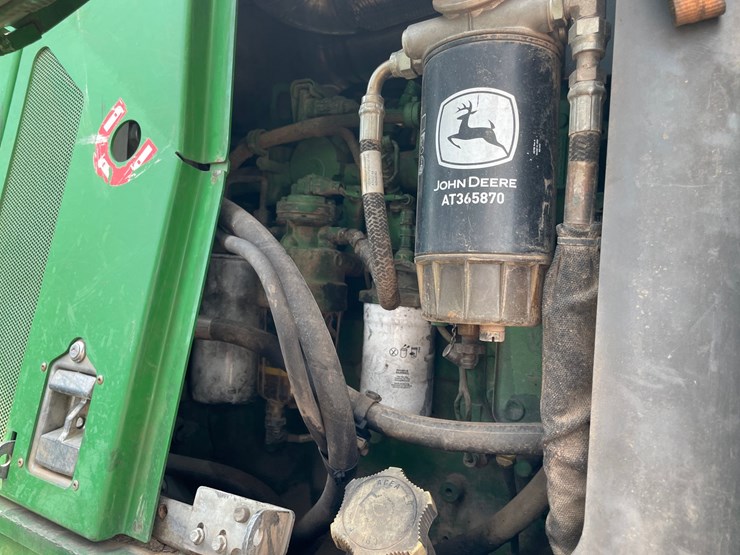2015-deere-648l-image-38